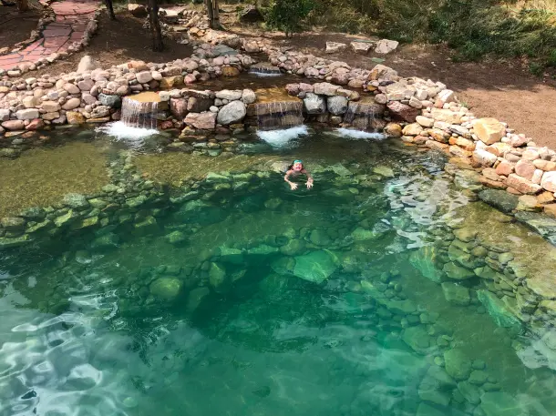 large lagoon with swimmer